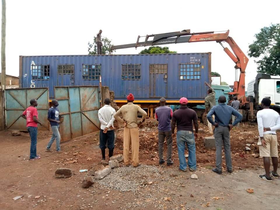 Truck Mounted Crane Hire in Nairobi lifting a container house